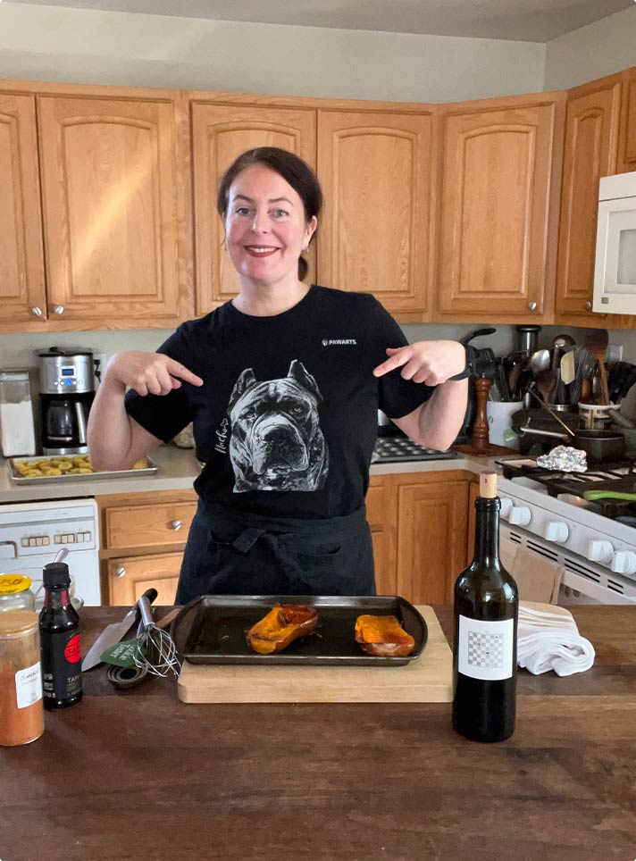 Image of Sunny displaying ingredients for homemade dog food recipe.